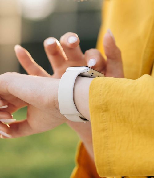 Person touching smart watch