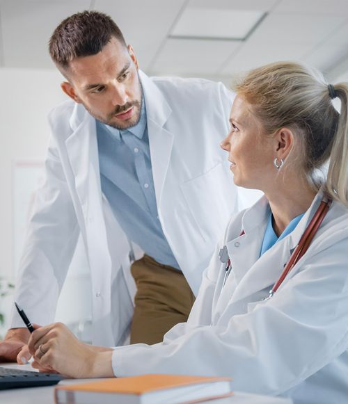 Two doctors talking to each other